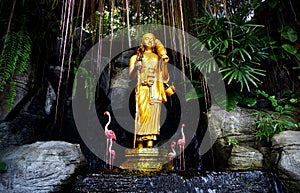 Golden Buddha statue in the garden