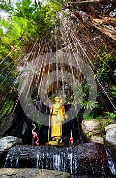 Golden Buddha statue in the garden