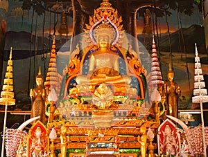 Golden buddha statue inside a temple