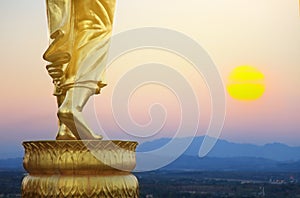 Golden buddha statue in Khao Noi temple Nan Province Thailand