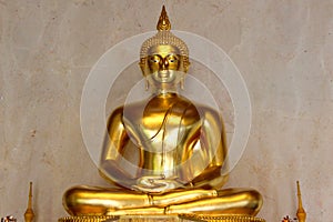 Golden Buddha statue-meditation posture in thai temple