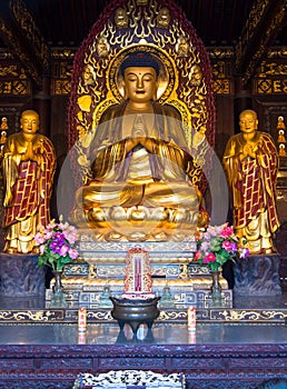 Golden Buddha statue sitting