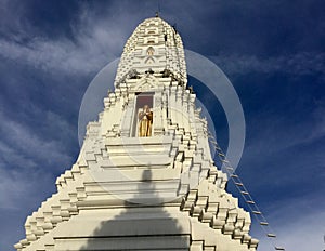 Golden Buddha statue in Stupa, Thailand photo