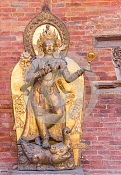 Golden Buddha statue at the Sundari Chowk temple in Patan