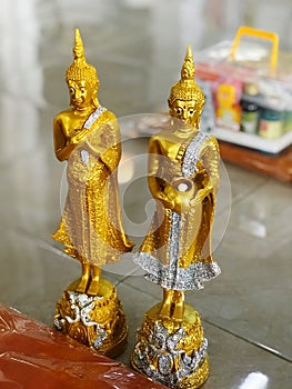 golden buddha statue in thai temple, Thailand.