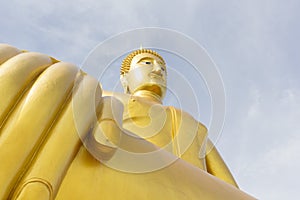 Golden Buddha statue at Wat Bangchak in Nonthaburi, Thailand
