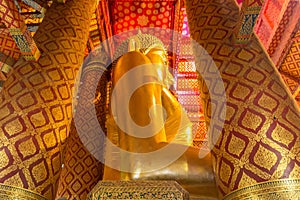 Golden Buddha statue in Wat Phanan Choeng temple. Ayutthaya Historical Park, Thailand. UNESCO World Heritage Site.