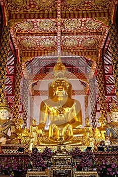 Golden buddha statue in wat suan dok temple