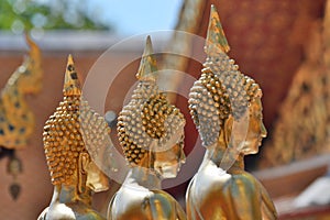 Golden Buddha statues detail. Wat Phra That Doi Suthep temple. Chiang Mai. Thailand