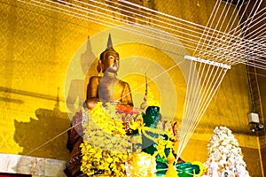 Golden Buddha statues at the temple Luang Poh Pag Dang Nakonnayok