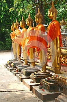 Golden Buddha statues in a temple, Vientiane Laos