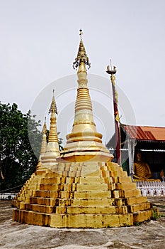 Golden Buddha Three Pagodas, religious symbols based on the Burmese War.Thailand on May 6, 2018.