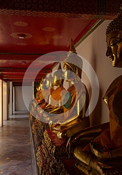 Golden buddha tidily at terrace