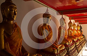 Golden buddha tidily at terrace