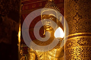 Golden Buddha at the Wat May Buddhist temple, Luang Prabang, Laos