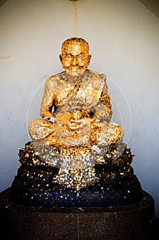 Golden buddhism statue Loung Poh Toe