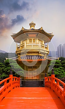 Golden buddhism tower with red bridge