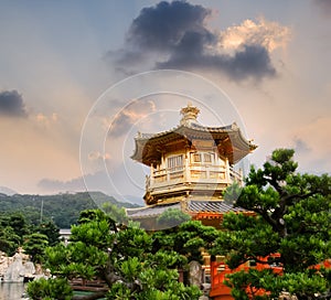 Golden buddhism tower with sky and light