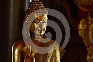 Golden of buddish state in the art style ,Wat Krathum Suea Pla t