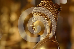 Golden of buddish state in the art style ,Wat Krathum Suea Pla t