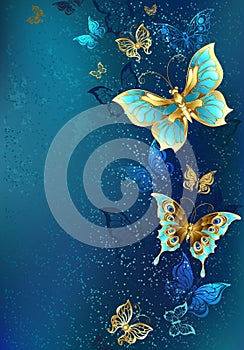 Golden butterflies on a blue background