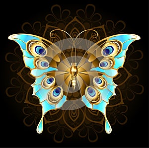 Golden butterfly with turquoise