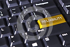 Golden button with text of reliability photo
