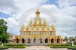 Golden Castle at Wat Chantharam Wat Tha Sung Uthaithani ,Thailand an old temple decorated with beautifully carved gold carvings