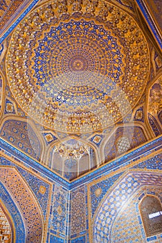 Golden ceiling of Tilya-Kori Madrasa at Registan in Samarkand, Uzbekistan. It is part of the World Heritage Site.