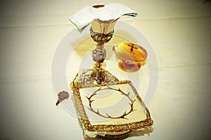 Golden Chalice with consecrated hosts in a Christian Church