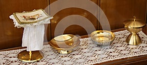 golden chalice and paten for Holy Communion