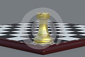 Golden chess figure rook on chess board on gray background. Table games