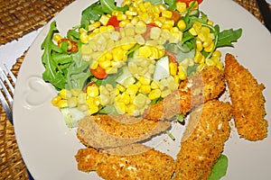 Golden chicken goujons with Sweetcorn and salad