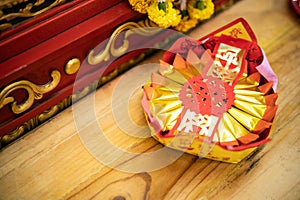 Golden Chinese folded paper ghost and gods for burning, Ghost and gods money offering in the temple in Chinese temple