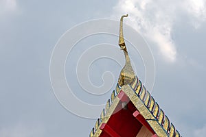 Golden chofah of a wat in Bangkok, Thailand, Asia