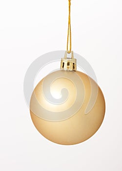 Golden Christmas  ball  hanging. Over white background