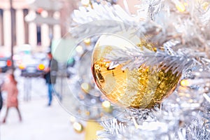 Golden Christmas ball in Paris, France