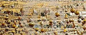 Golden Christmas balls, silve Christmas balls and small lights