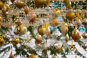 Golden Christmas balls, silve Christmas balls and small lights