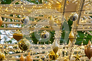 Golden Christmas balls, silve Christmas balls and small lights