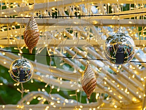 Golden Christmas balls, silve Christmas balls and small lights