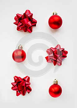 Golden Christmas baubles decoration on bright background. Flat lay