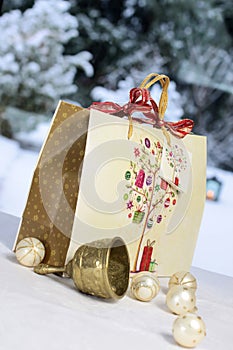 Golden Christmas bell, balls and gift bag