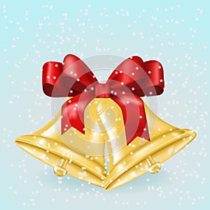 Golden Christmas bells with red ribbon bow