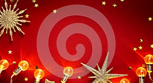 Golden Christmas Tree Decoration And Shiny Holidays Lights On Red Background