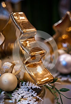 Golden Christmas tree figurine as home decoration