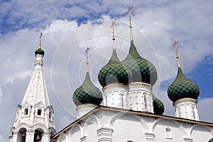 Golden church cupolas. Blue sky background.