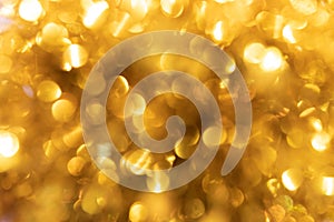 Golden circle bokeh, abstract of blurred golden bokeh background