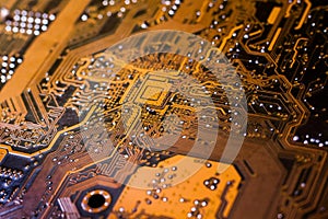 A golden circuit board close up