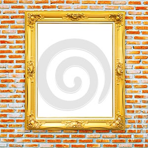 Golden classic photo frame on bricked wall background